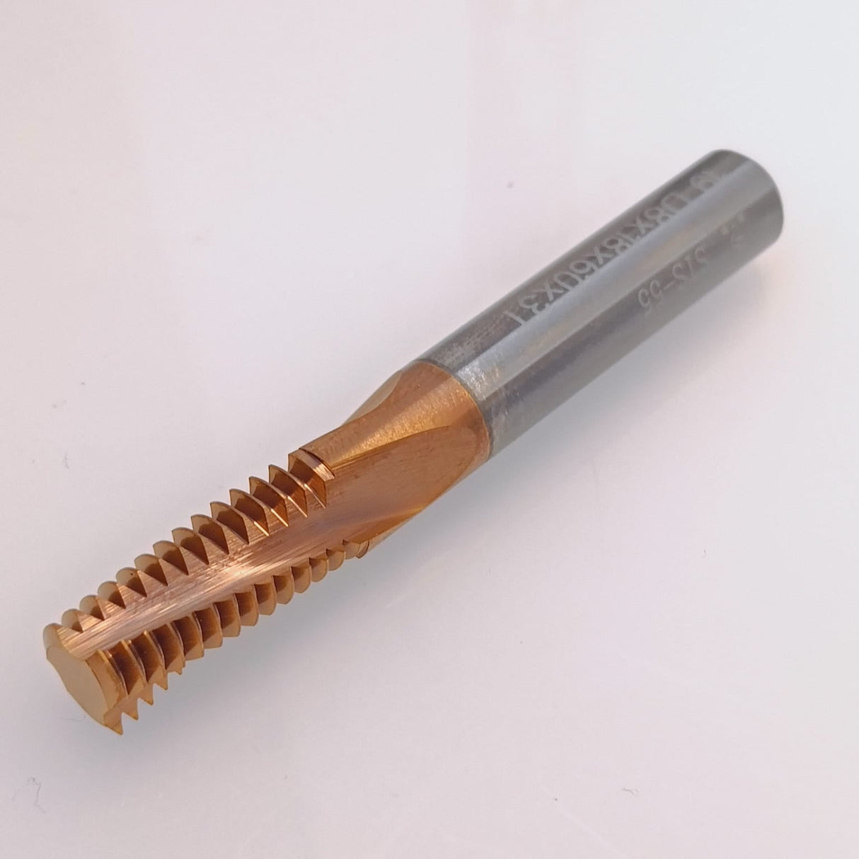 Three coated metal thread taps