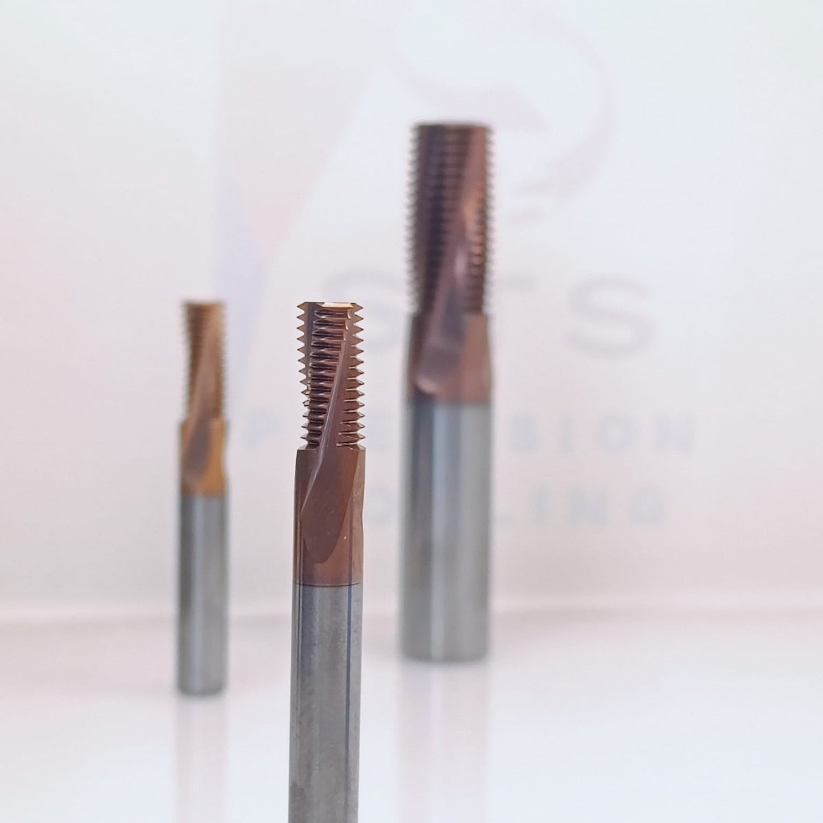 Coated metal thread cutting taps