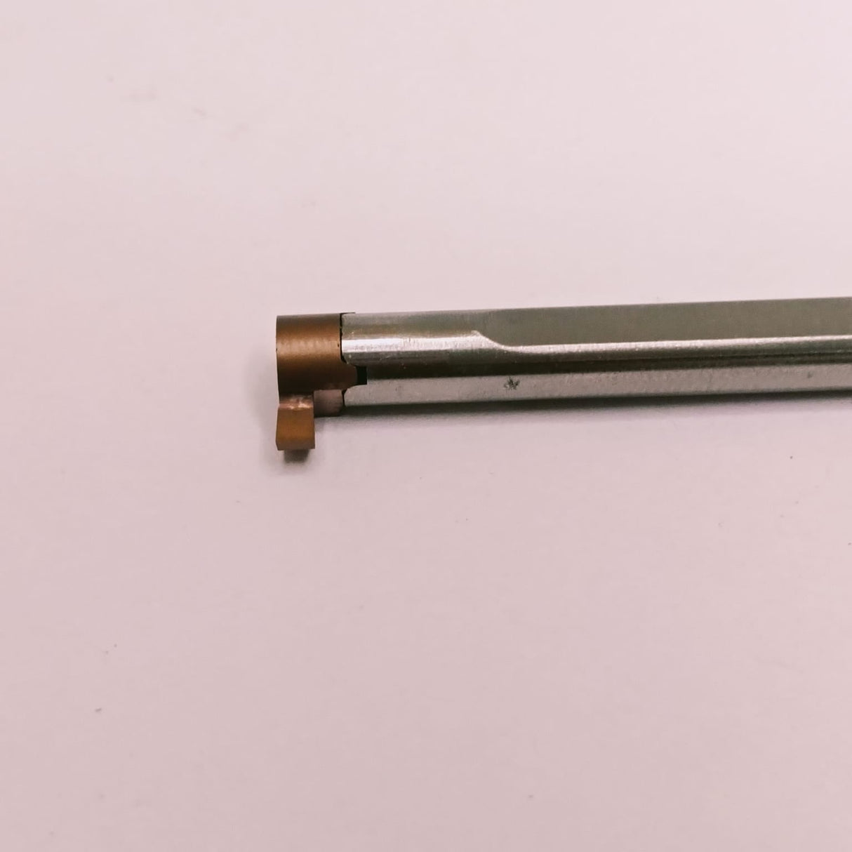 Metal tool with insert