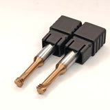 Two metal drill bits in a black plastic holder