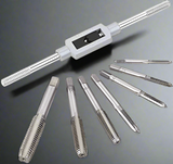 Metal tap and wrench set