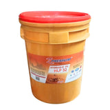 Yellow bucket of Z Premium hydraulic oil with a red lid 