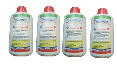 Four bottles of Z Premium lubricant 