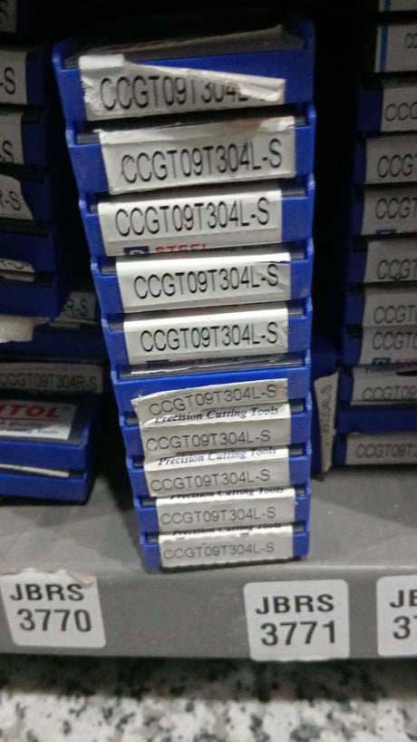 Stacks of metal cutting inserts