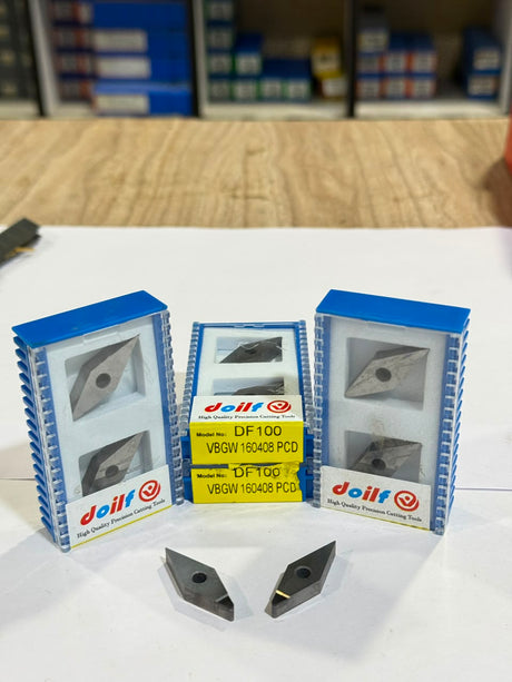 Carbide diamond grooving and parting inserts