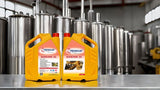 Two yellow oil cans labeled 'Z Premium'