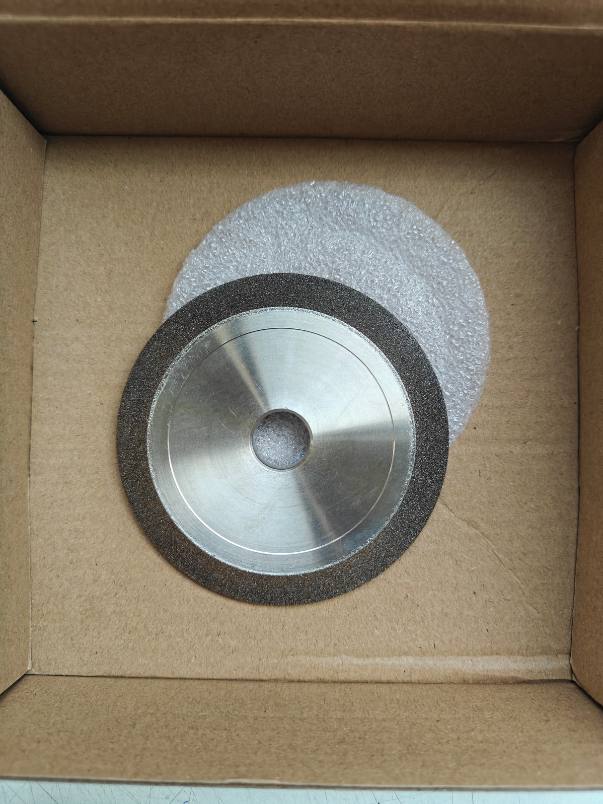 Two metal grinding wheels