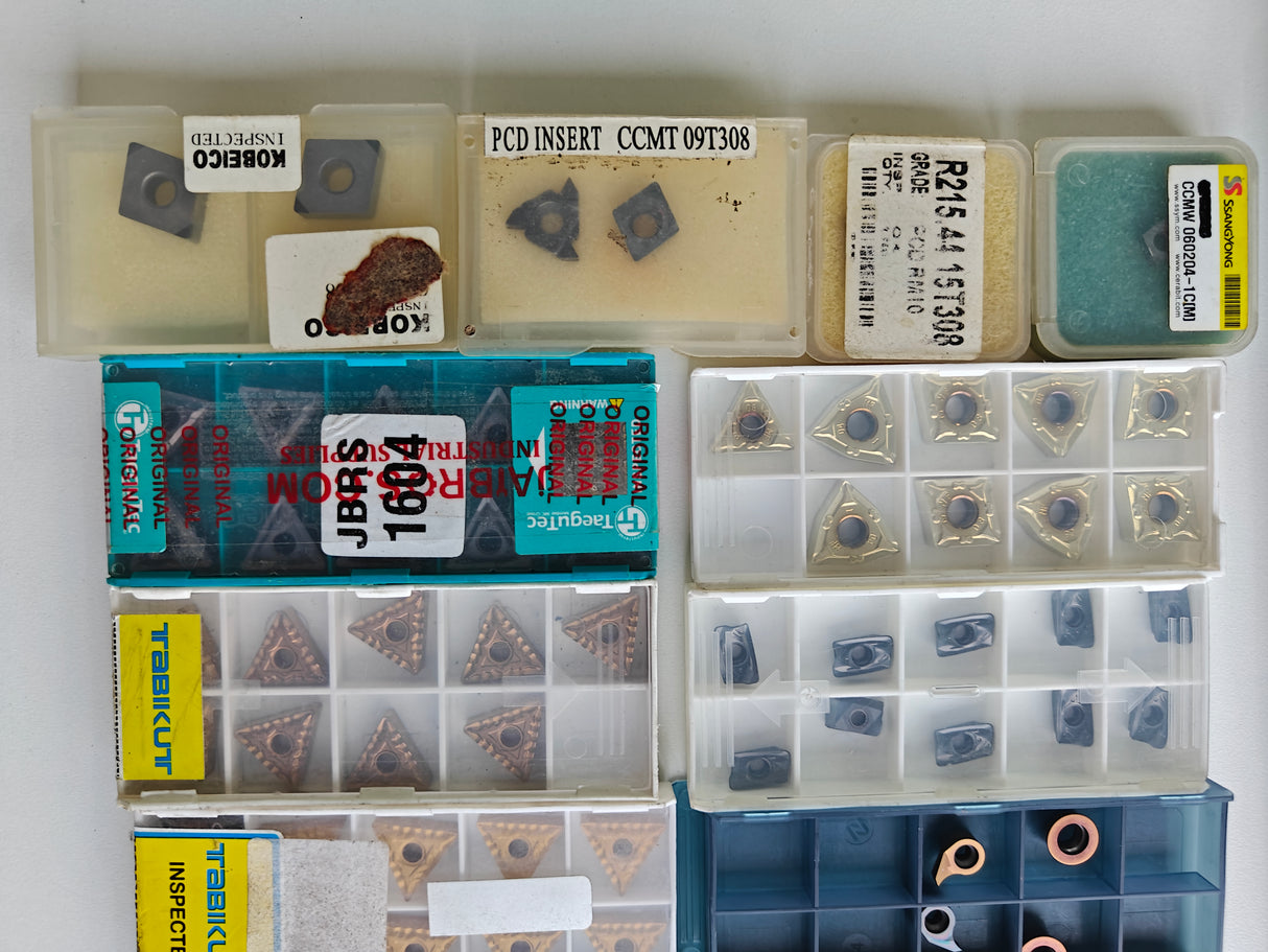 Assorted PCD and carbide inserts