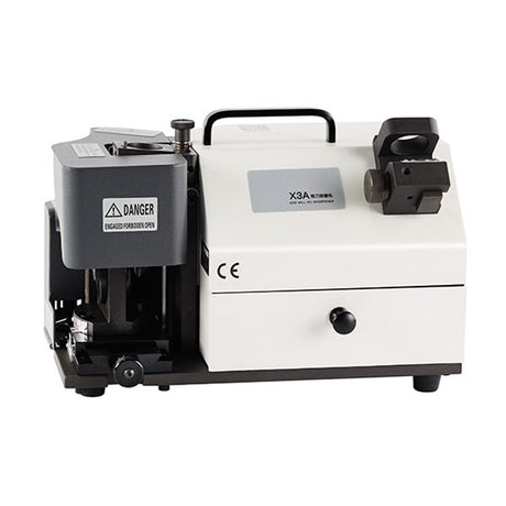 White and black machine with X3A branding 