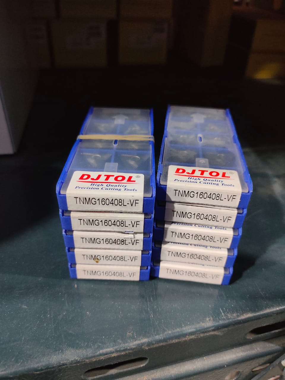Stack of DJTOL-branded boxes
