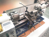 Metal lathe in workshop setting