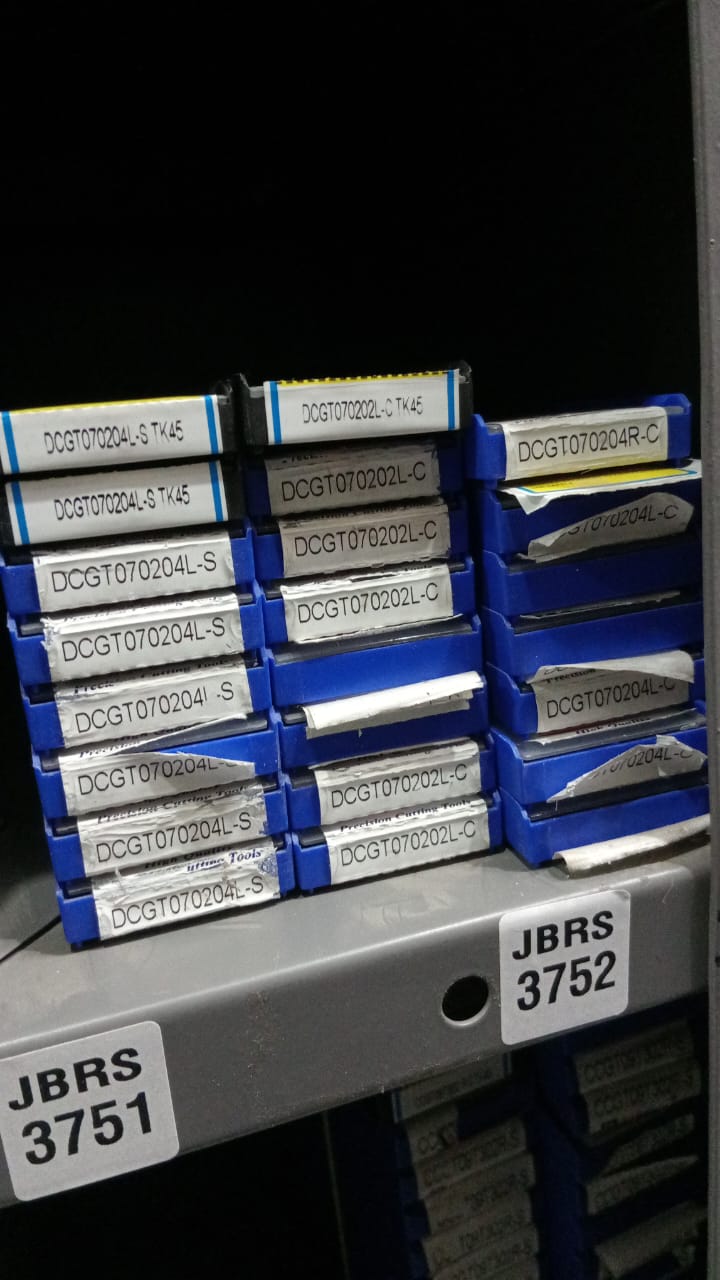 Stack of metal cutting tools in blue 