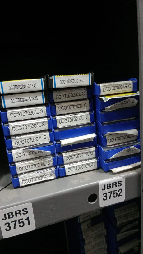 Stack of metal cutting tools in blue 