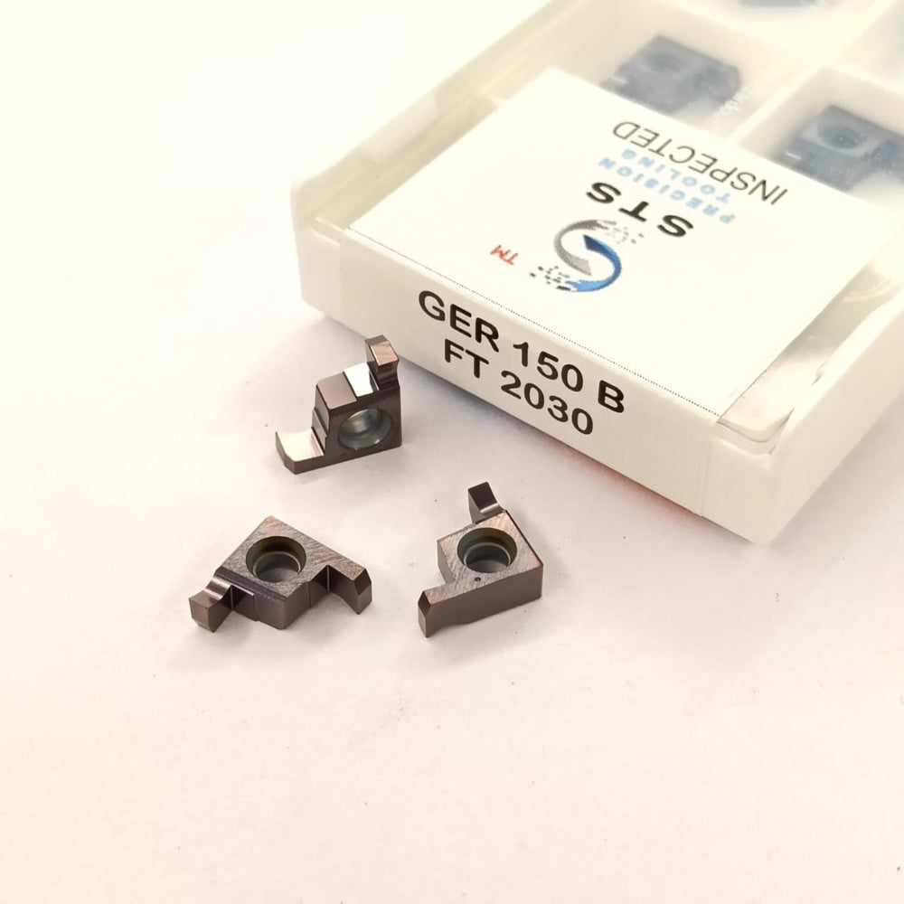 Metal cutting inserts with a box labeled 'STS'