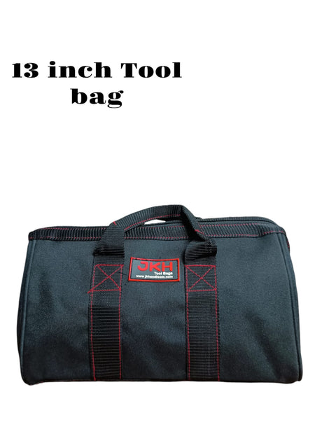 Black tool bag with red stitching and a visible brand logo 
