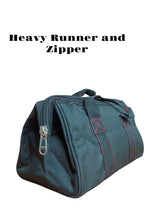 Blue duffel bag with a heavy runner and zipper 