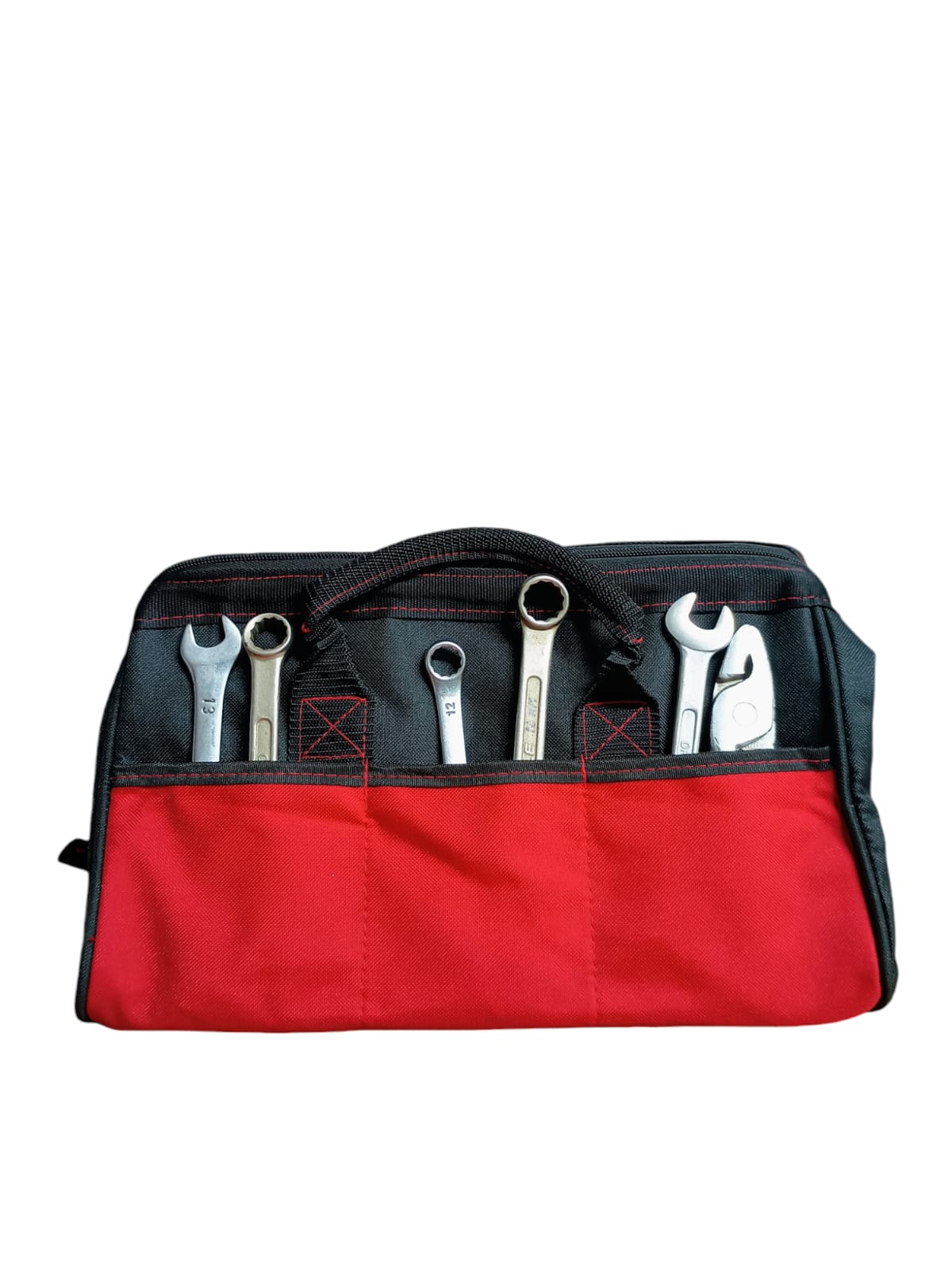 Red tool bag with various tools 