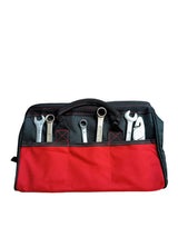 Red tool bag with various tools 