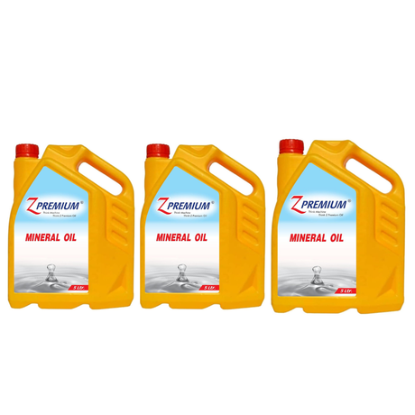 Three yellow Z Premium mineral oil 