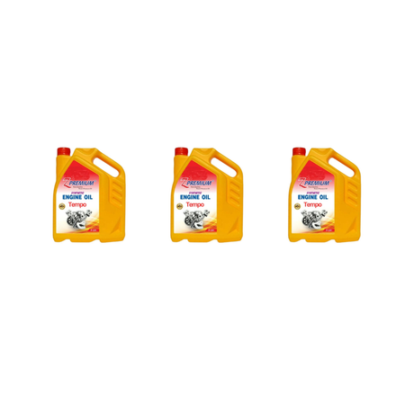 Three yellow engine oil jugs with red labels 