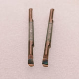 Two metal turning tool inserts
