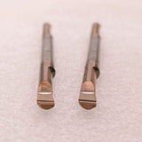 Two metal turning tool inserts