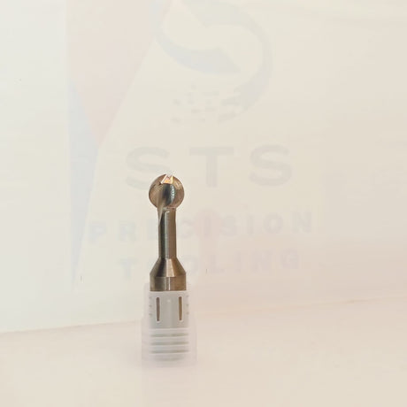 Solid carbide lollipop cutter standing upright with protective cap